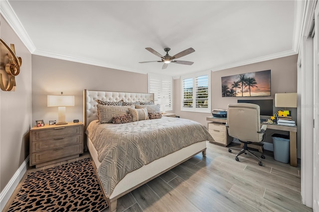 bedroom featuring light wood-style flooring, a ceiling fan, crown molding, and baseboards