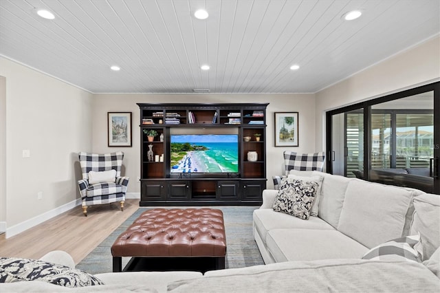 living area featuring recessed lighting, baseboards, light wood-style floors, and wooden ceiling