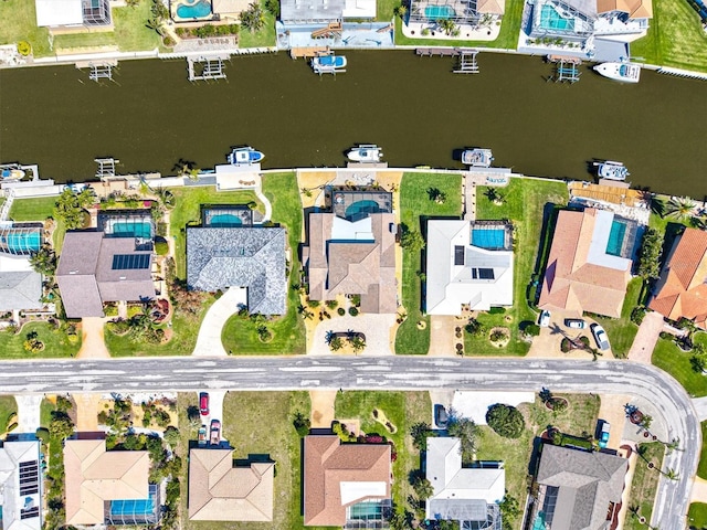 aerial view featuring a residential view and a water view