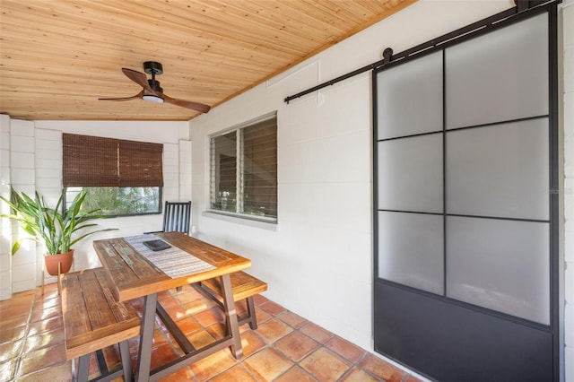 interior space featuring a ceiling fan