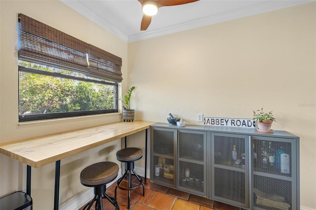 dining room featuring ornamental molding