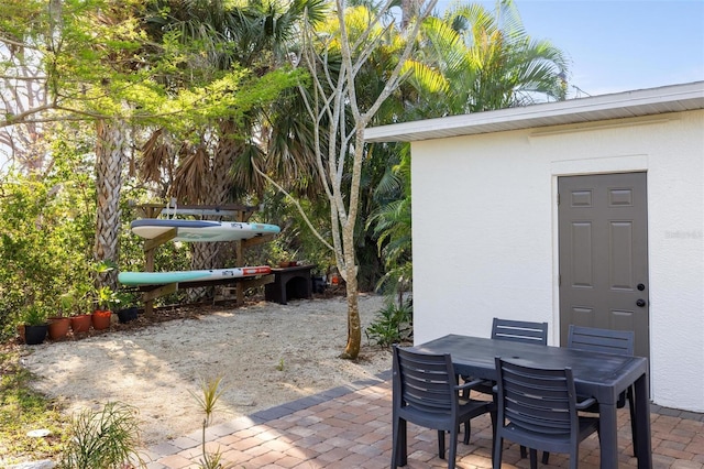 view of patio featuring outdoor dining space