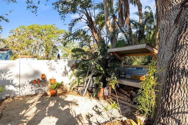 view of patio featuring fence