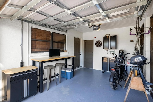 garage featuring a garage door opener