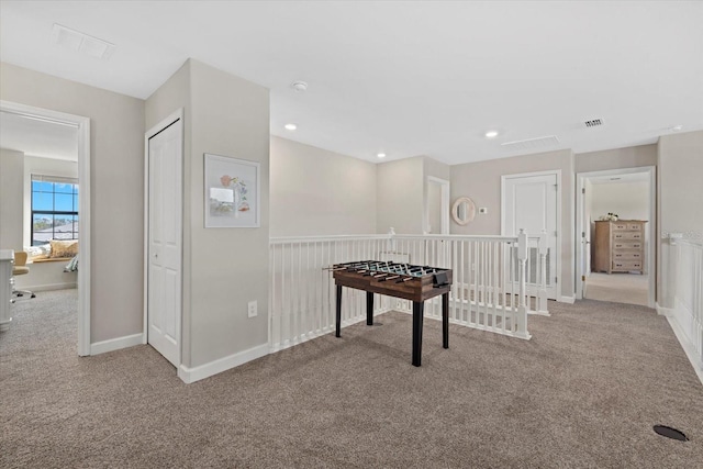 recreation room featuring recessed lighting, visible vents, carpet floors, and baseboards