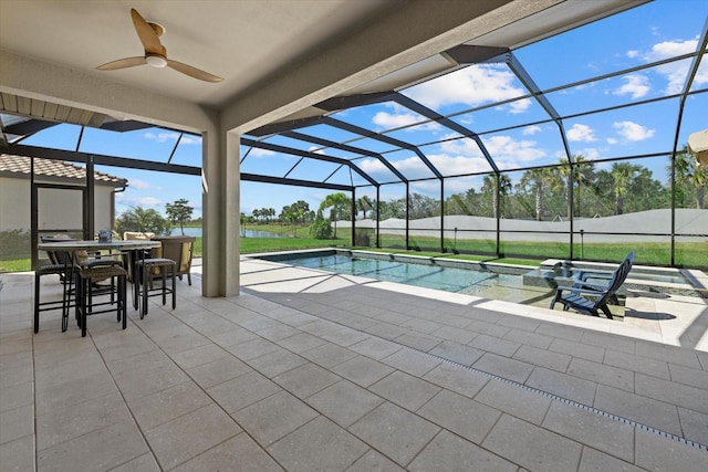 view of pool featuring a fenced in pool, ceiling fan, glass enclosure, a patio area, and outdoor dining space