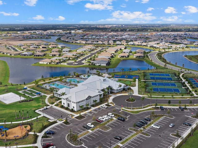 aerial view featuring a residential view and a water view