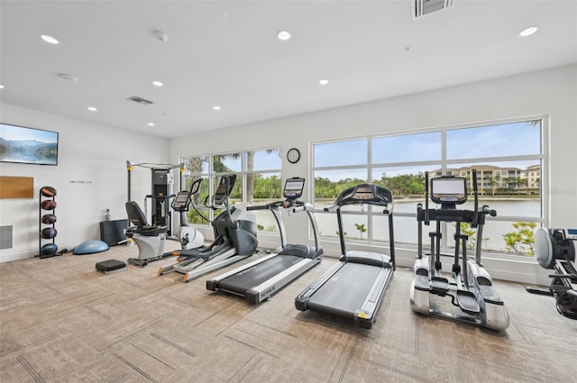 exercise room with recessed lighting, carpet, and visible vents