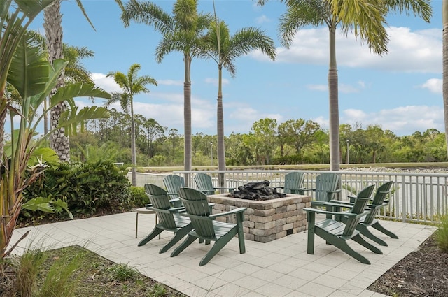 view of patio / terrace with an outdoor fire pit