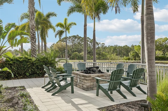 view of patio / terrace featuring a fire pit