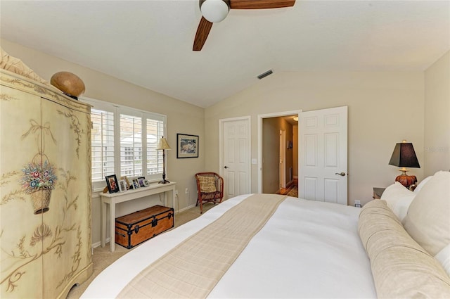 bedroom with visible vents, baseboards, ceiling fan, vaulted ceiling, and carpet flooring