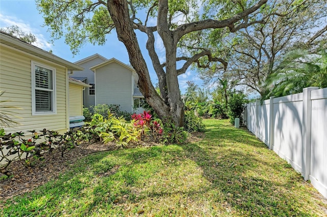 view of yard featuring fence