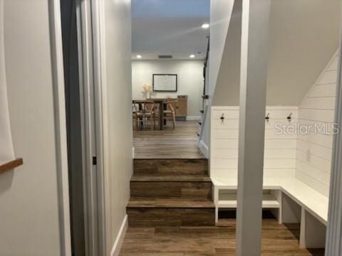 interior space with recessed lighting, stairway, and wood finished floors