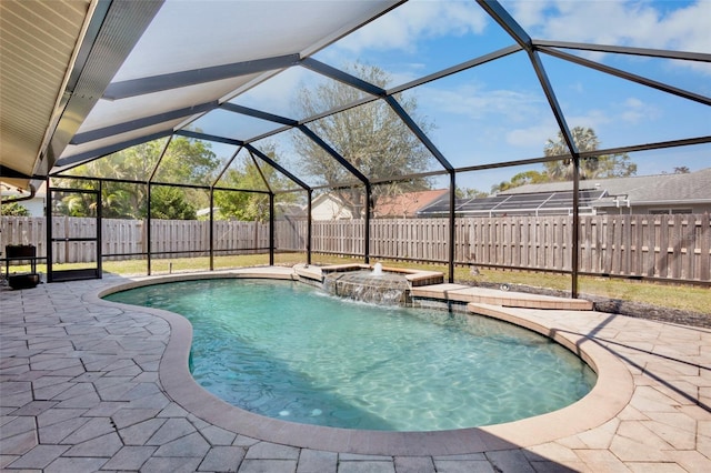 view of pool with a patio area, a fenced backyard, a fenced in pool, and a lanai