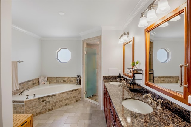 bathroom featuring a sink, ornamental molding, double vanity, and a bath