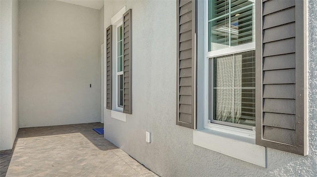 exterior space with stucco siding