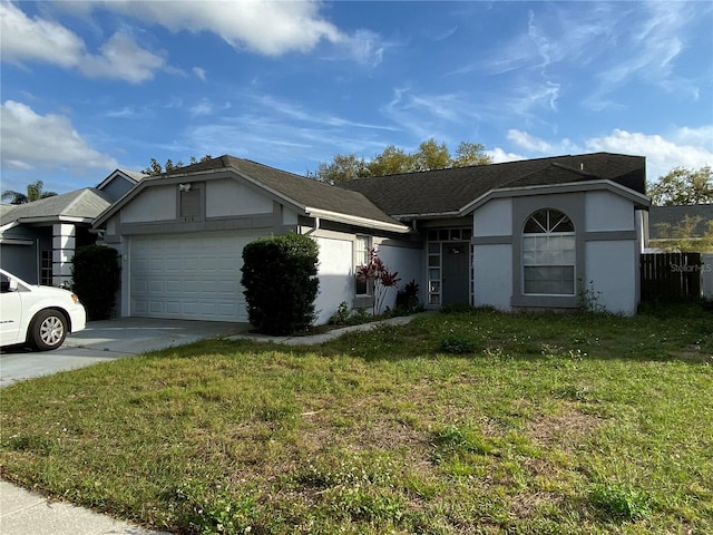 ranch-style home with a front yard, a garage, driveway, and stucco siding