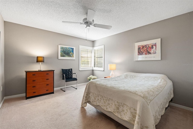 7300 Wax Myrtle Way, Sarasota, FL 34241 - bedroom with carpet flooring, ceiling fan, and a textured ceiling