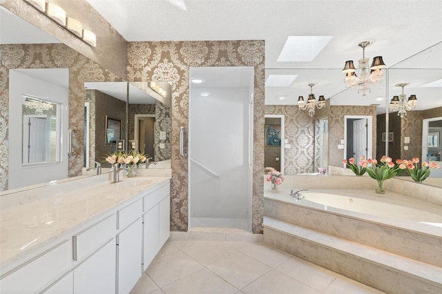 7300 Wax Myrtle Way, Sarasota, FL 34241 - bathroom featuring wallpapered walls, a chandelier, a garden tub, vanity, and tile patterned flooring