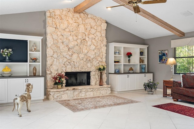 7300 Wax Myrtle Way, Sarasota, FL 34241 - living area featuring a ceiling fan, a stone fireplace, and light tile patterned floors