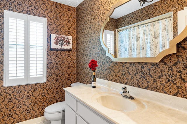 7300 Wax Myrtle Way, Sarasota, FL 34241 - full bathroom with wallpapered walls, vanity, and a textured ceiling