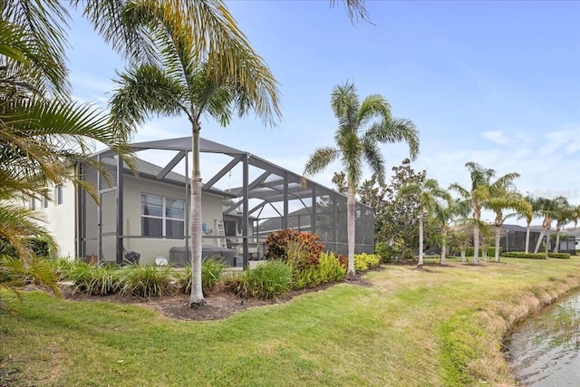 4691 Claremont Park Dr, Bradenton, FL 34211 - view of green lawn with a lanai