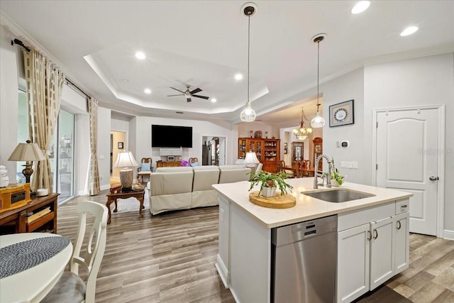 4691 Claremont Park Dr, Bradenton, FL 34211 - kitchen featuring stainless steel dishwasher, light wood-style flooring, a ceiling fan, recessed lighting, and light countertops