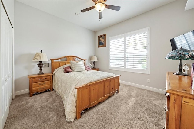 4691 Claremont Park Dr, Bradenton, FL 34211 - bedroom featuring light colored carpet and a ceiling fan
