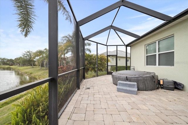 4691 Claremont Park Dr, Bradenton, FL 34211 - sunroom featuring a jacuzzi and a water view