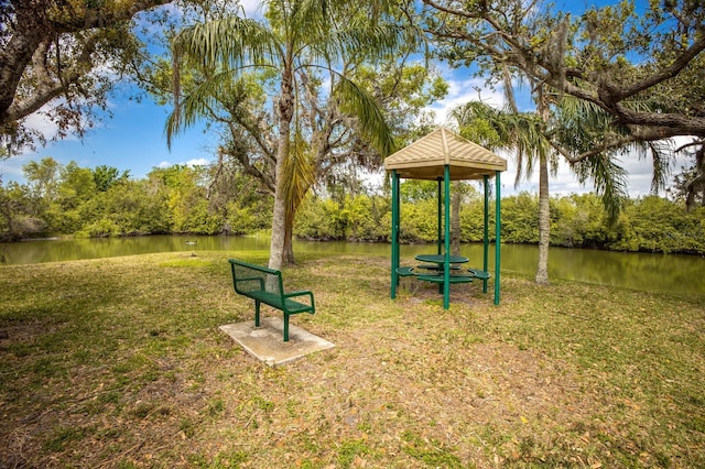 view of playground featuring a water view