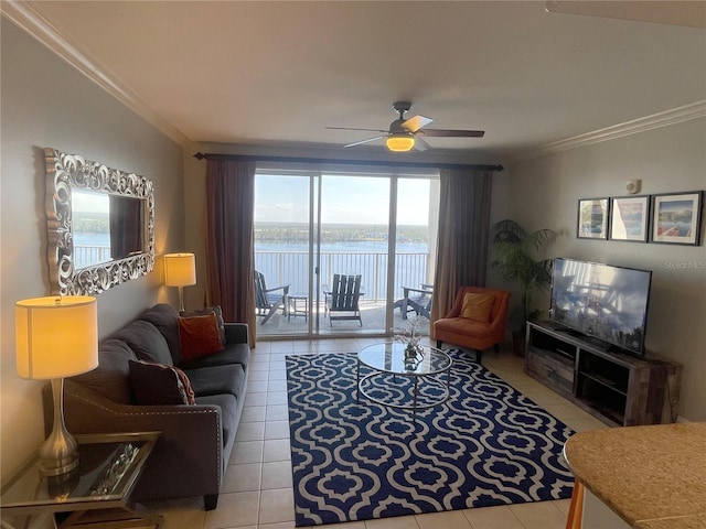 13415 Blue Heron Beach Dr Unit 1407, Orlando, FL 32821 - living area featuring light tile patterned floors, ceiling fan, and ornamental molding