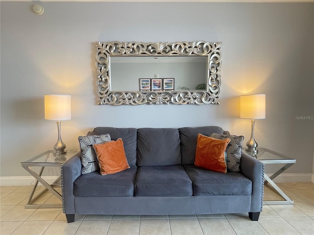 13415 Blue Heron Beach Dr Unit 1407, Orlando, FL 32821 - living room featuring tile patterned floors and baseboards