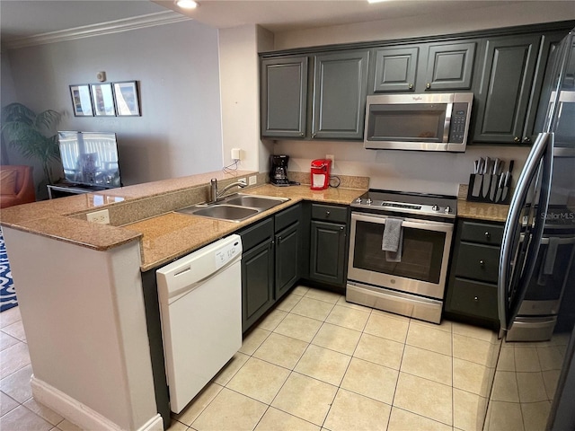 13415 Blue Heron Beach Dr Unit 1407, Orlando, FL 32821 - kitchen with crown molding, light tile patterned floors, a peninsula, stainless steel appliances, and a sink