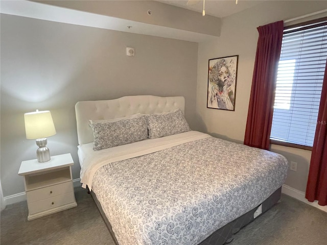 13415 Blue Heron Beach Dr Unit 1407, Orlando, FL 32821 - bedroom with dark colored carpet and baseboards