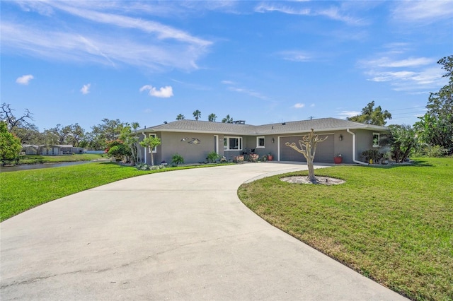 ranch-style house with a garage, stucco siding, driveway, and a front yard