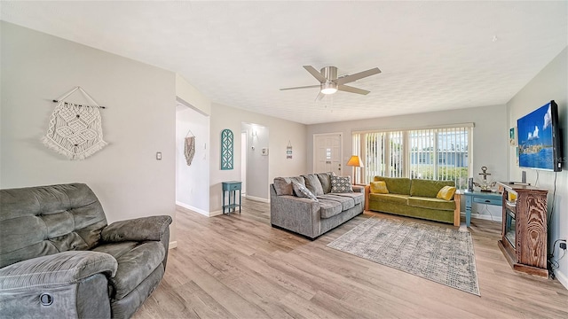 22201 Olean Blvd, Port Charlotte, FL 33952 - living area with baseboards, ceiling fan, and light wood-type flooring