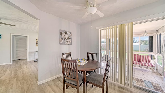 22201 Olean Blvd, Port Charlotte, FL 33952 - dining space featuring baseboards, light wood-type flooring, and ceiling fan