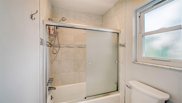 22201 Olean Blvd, Port Charlotte, FL 33952 - bathroom featuring enclosed tub / shower combo and toilet