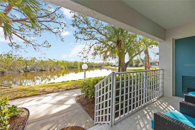 view of patio featuring a water view