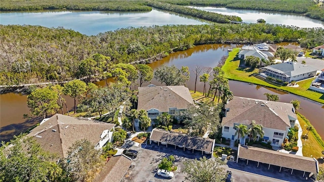 birds eye view of property with a residential view and a water view