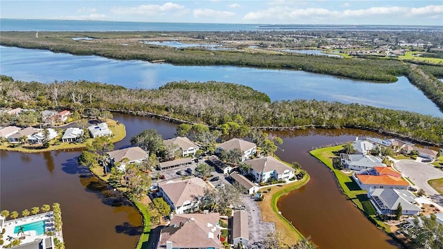 aerial view with a residential view and a water view