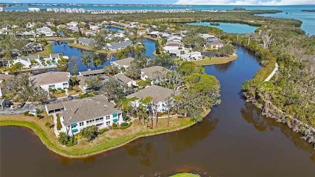 aerial view featuring a residential view and a water view