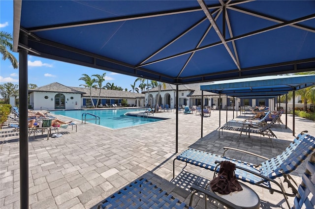 pool with a patio area