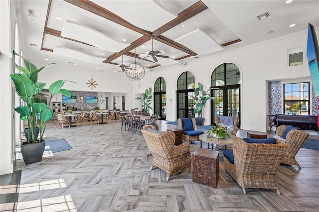 interior space featuring an outdoor living space, visible vents, outdoor dining area, and ceiling fan