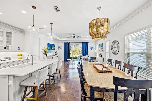 dining area featuring visible vents, ceiling fan with notable chandelier, ornamental molding, and recessed lighting