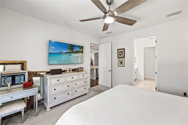bedroom with marble finish floor, visible vents, ceiling fan, connected bathroom, and baseboards