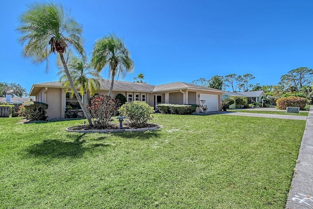 single story home with a front lawn, a garage, driveway, and stucco siding