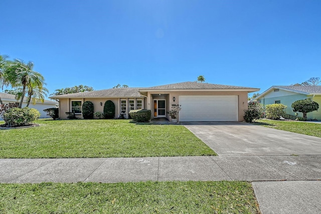 ranch-style house with stucco siding, an attached garage, driveway, and a front lawn