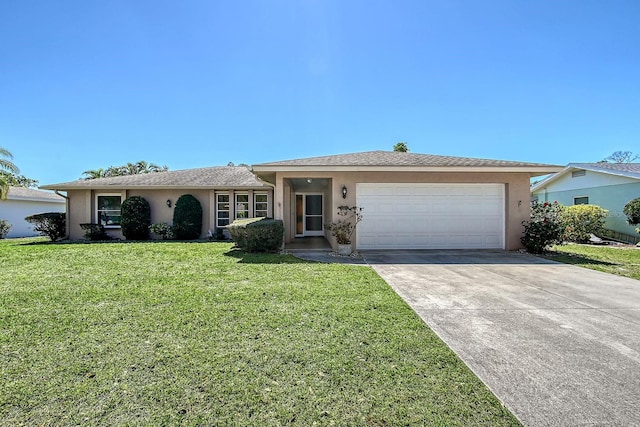 ranch-style house featuring a front yard, an attached garage, driveway, and stucco siding