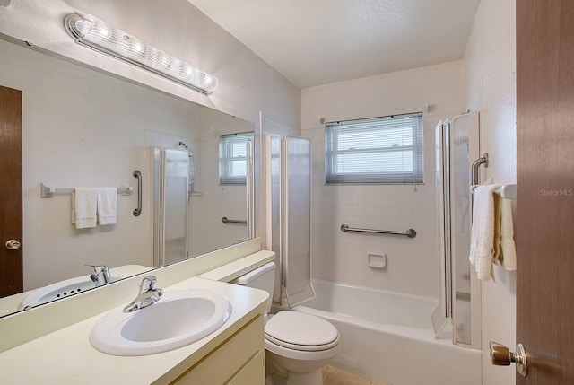 bathroom with toilet, vanity, and washtub / shower combination